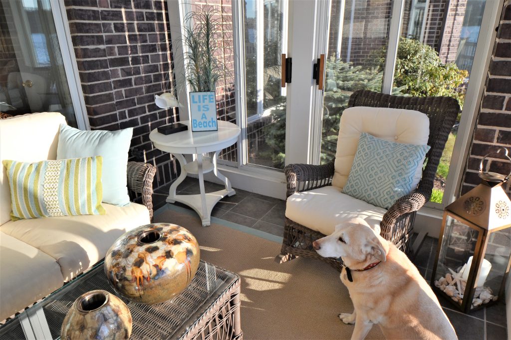 mall enclosed sunroom showcasing the difference between a three-season porch vs four-season porch